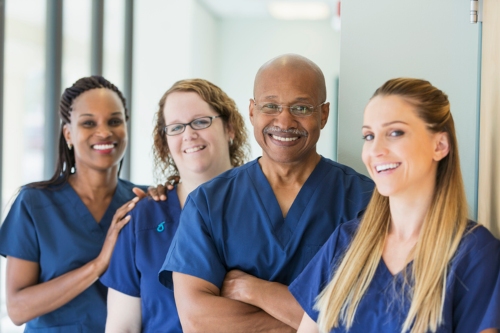 Four nurses working together at Booker T. Washington skilled nursing facility in Shreveport, LA