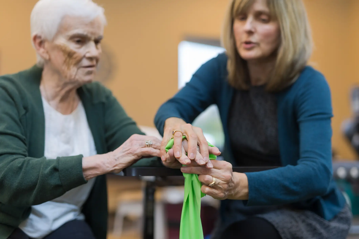 Occupational therapist with patient at skilled nursing facility in Shreveport, LA