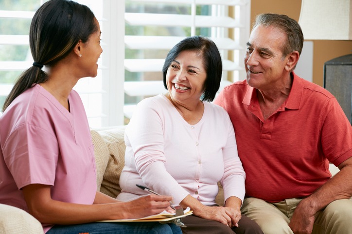A woman and two men discuss common myths about skilled nursing centers on a couch in Shreveport, LA